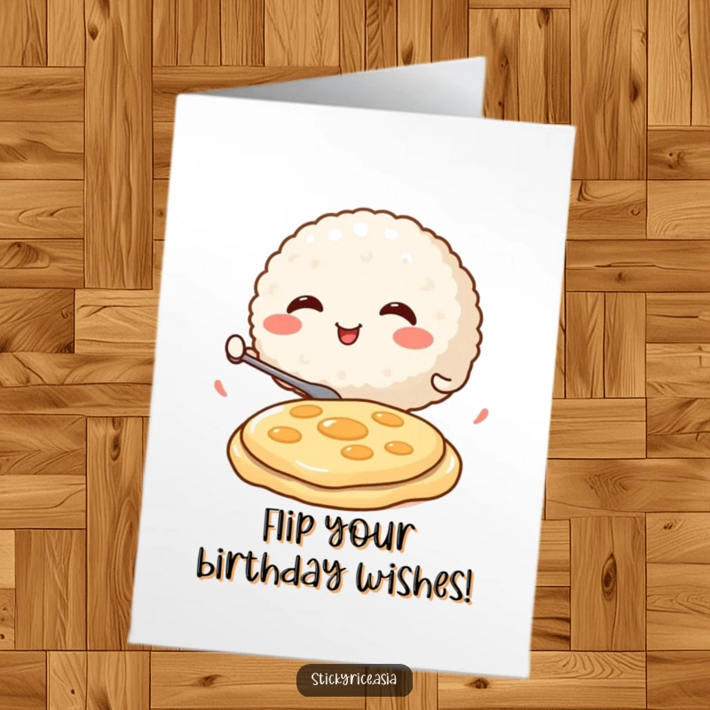 Funny Free Printable Birthday Card showing a cheerful, round rice ball masterfully flipping a tiny pancake with great enthusiasm.