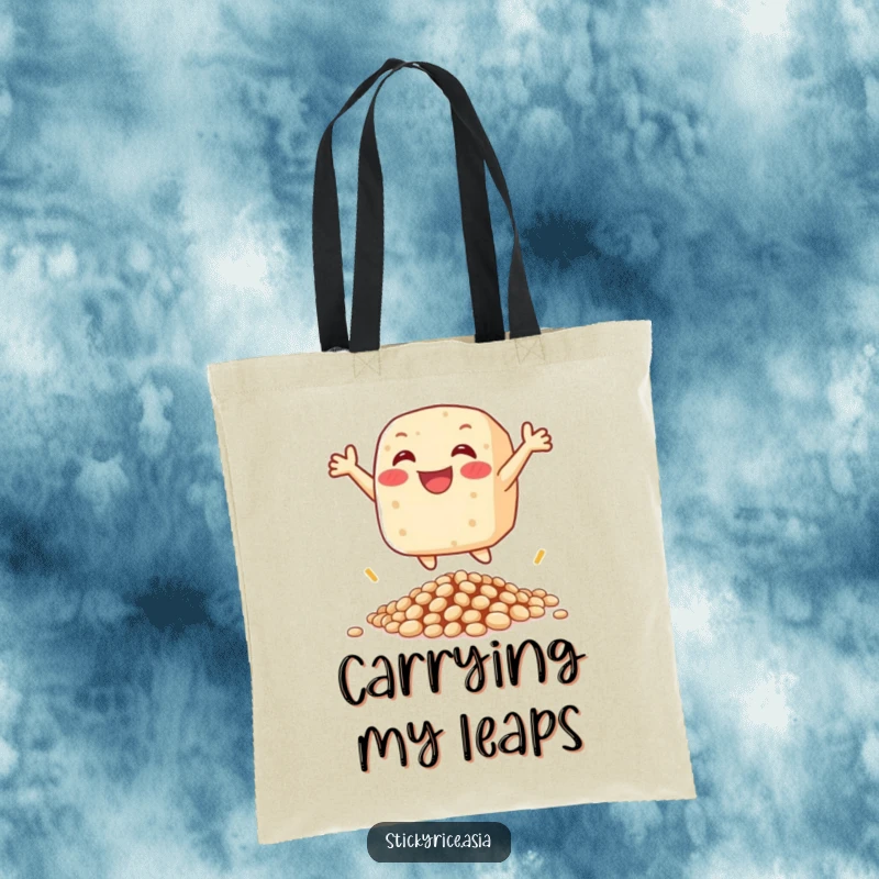 Funny tote bag featuring a happy sticky rice cake character leaping over beans, perfect for carrying items with a smile.